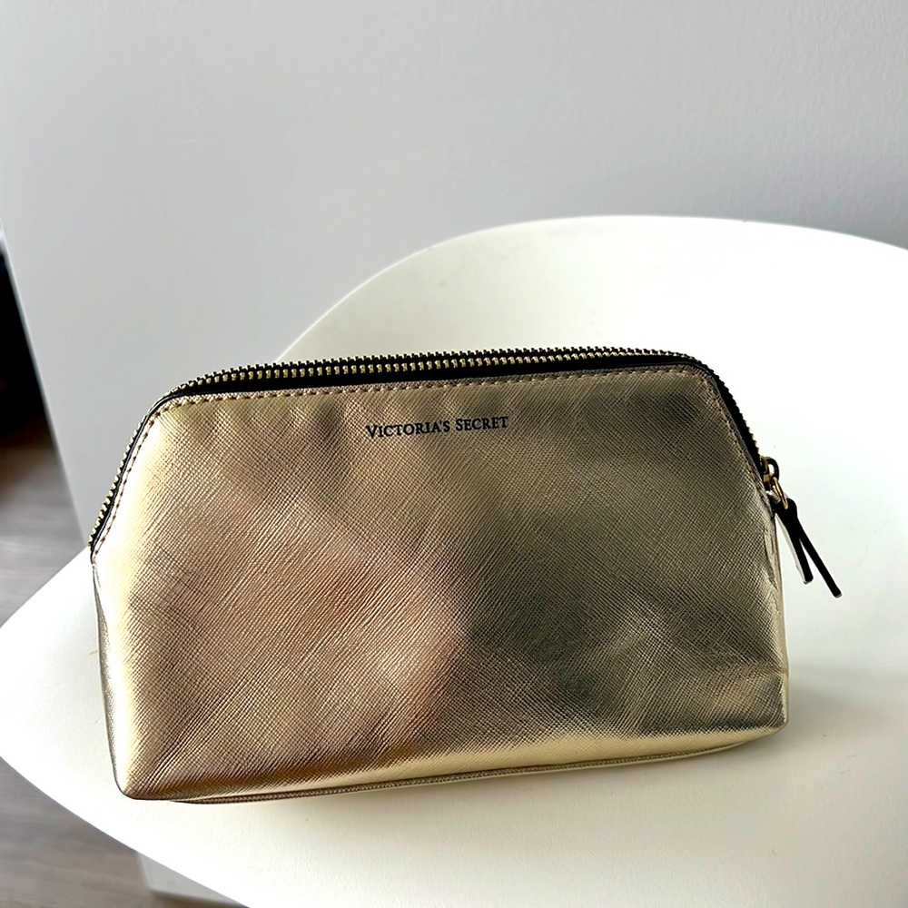 Victoria’s Secret makeup bag golden color